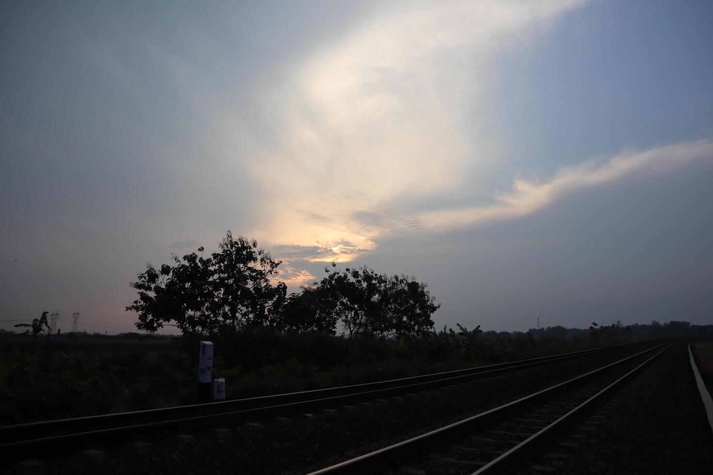 A train track with a train going down it photo