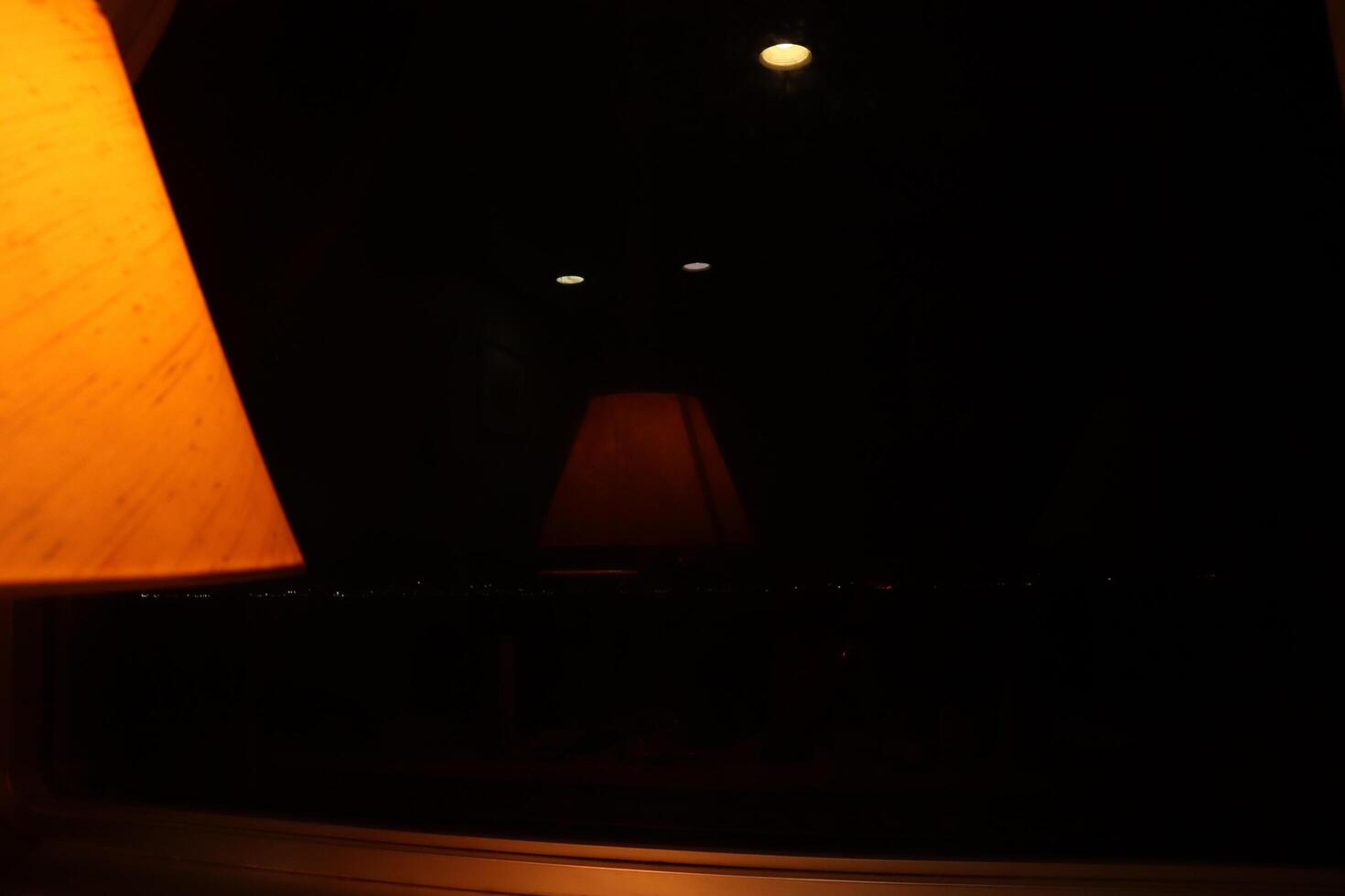 A lamp sitting on a table photo