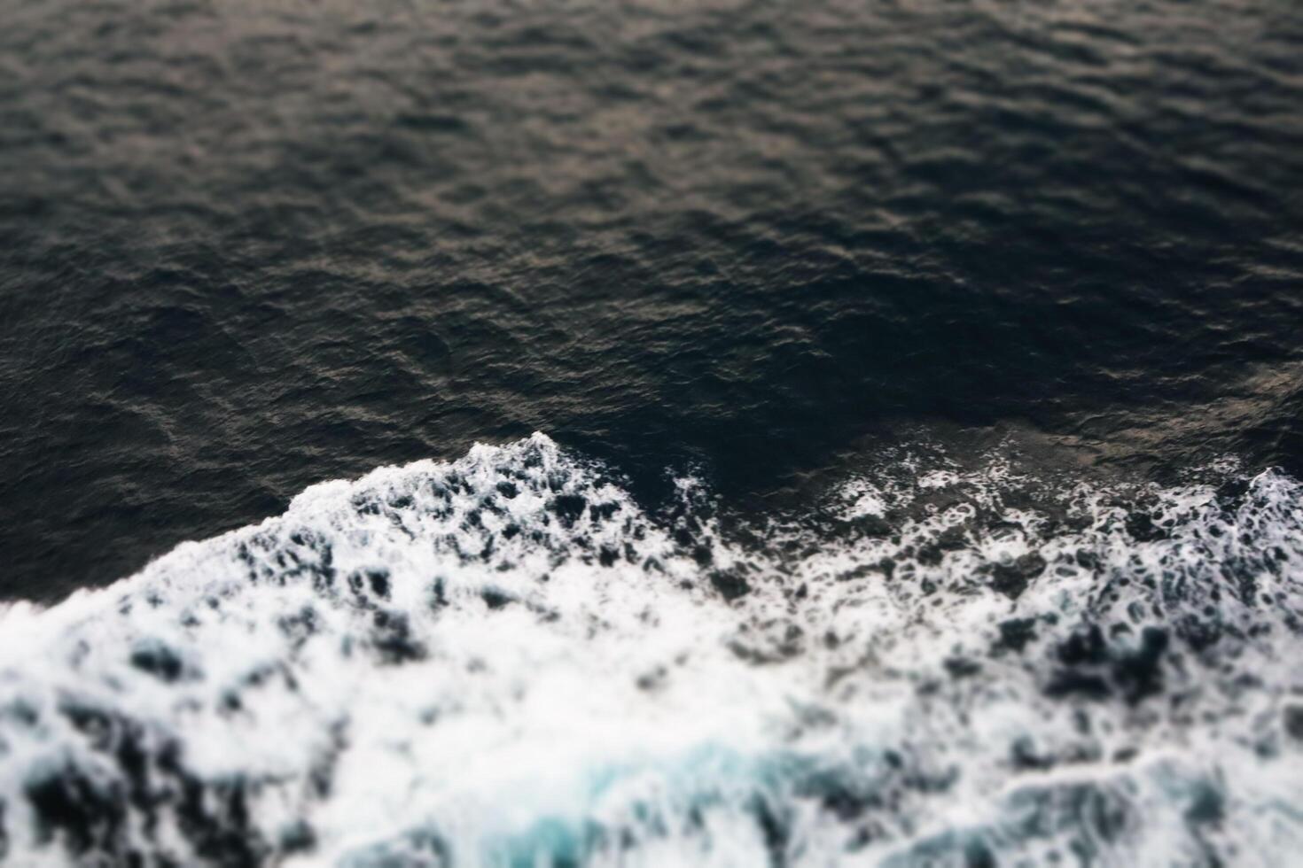 An aerial view of the ocean waves photo