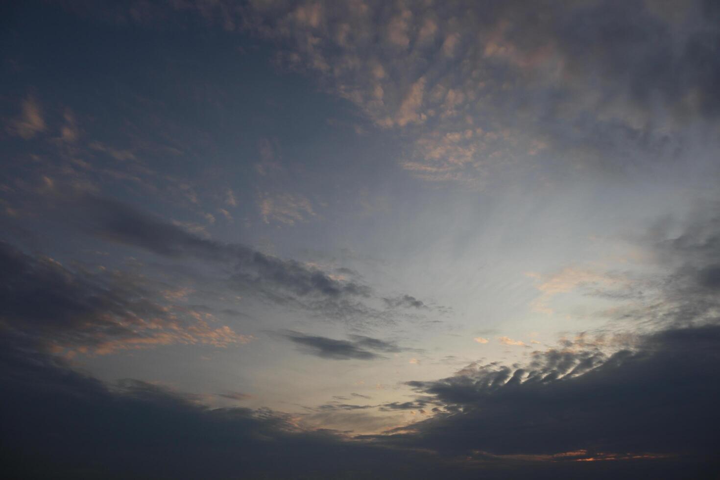 A person is flying a kite in the sky photo