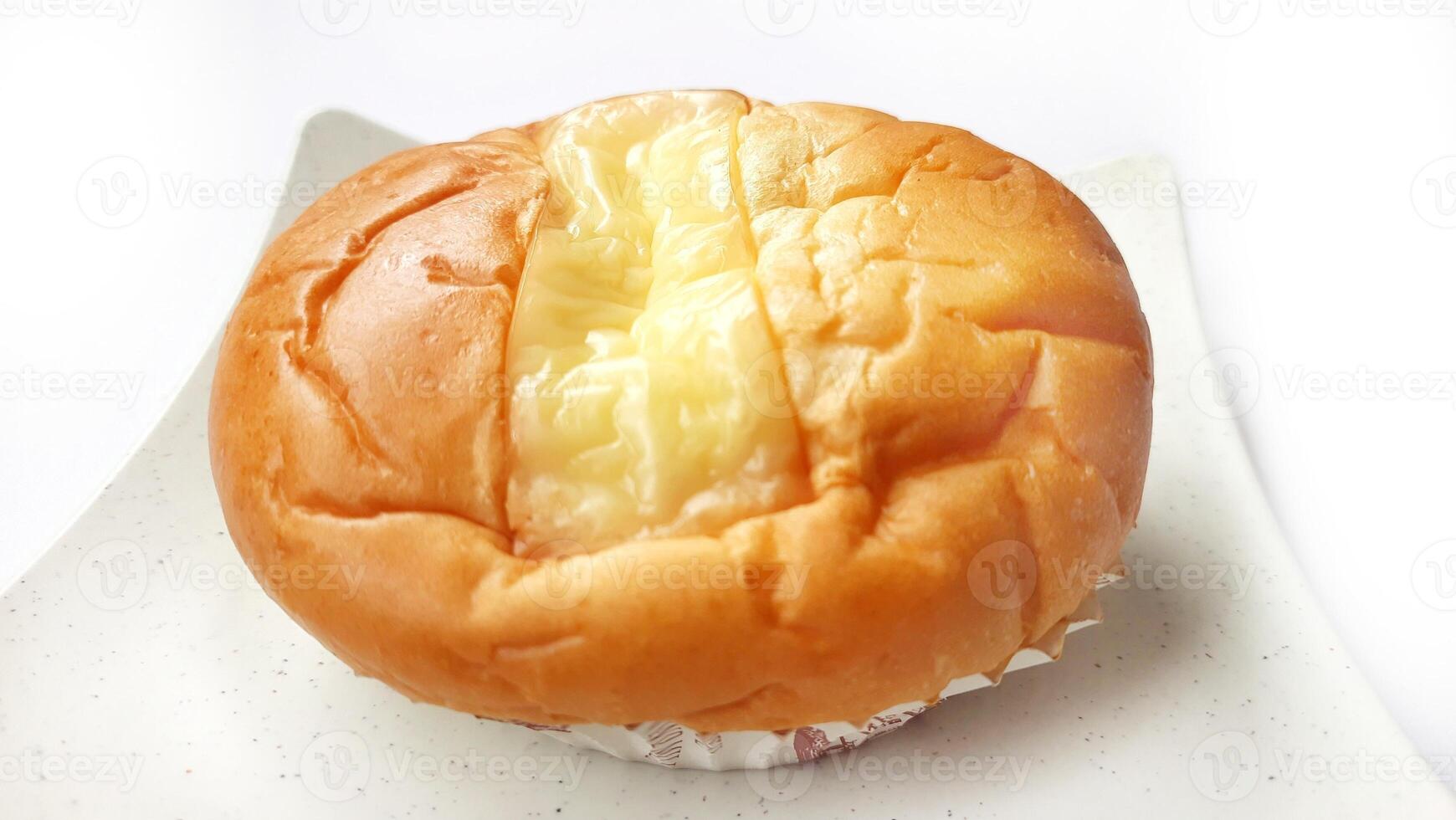 Whole of double cheese bread on plate photo