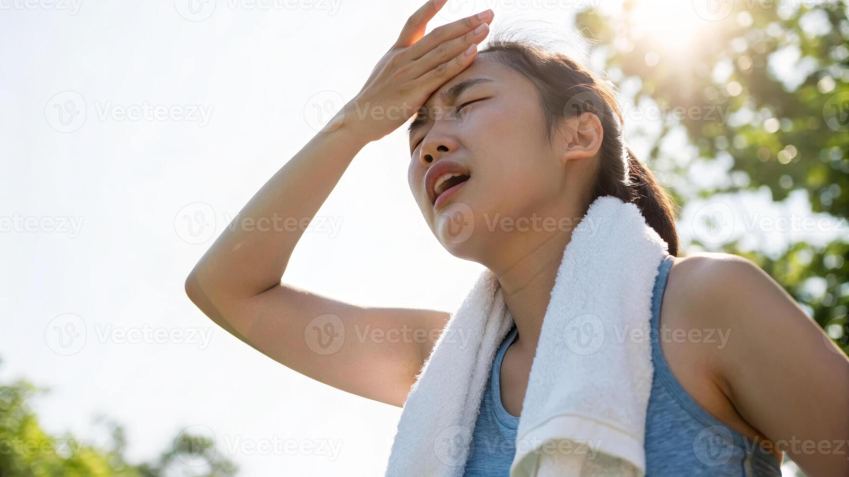 Woman outdoor heat exhaustion towel sunlight summer dehydration woman outdoors wipes her forehead with. Heat stroke concepts photo