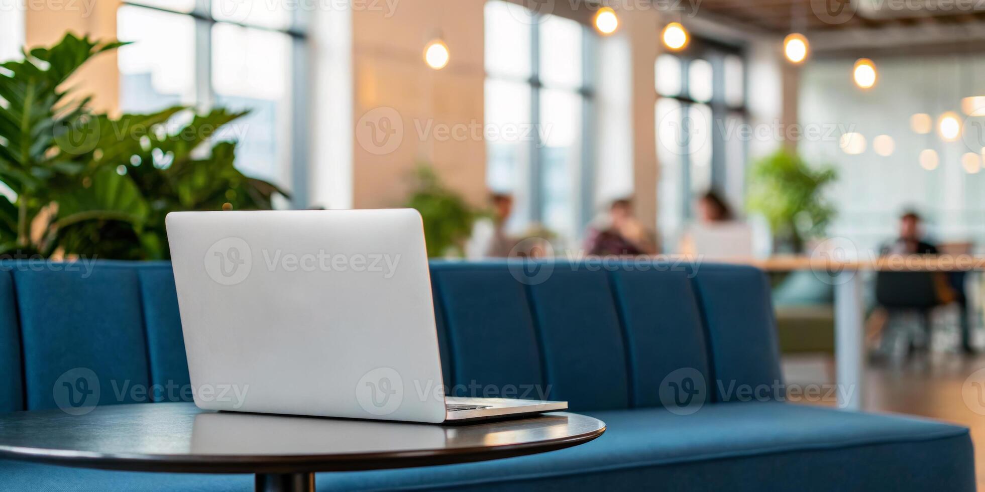 Flexible working. Laptop blue sofa modern office coworking space remote work flexible working, hybrid, work from home ,remote ,work life balance photo