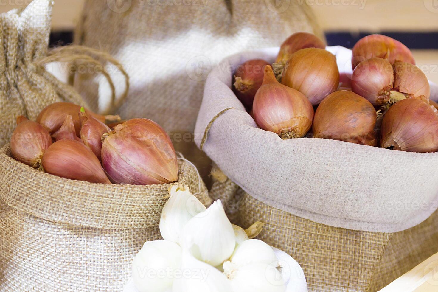 Red Onion In Fabric Bag, Bulb Onion Is Good For Health. photo