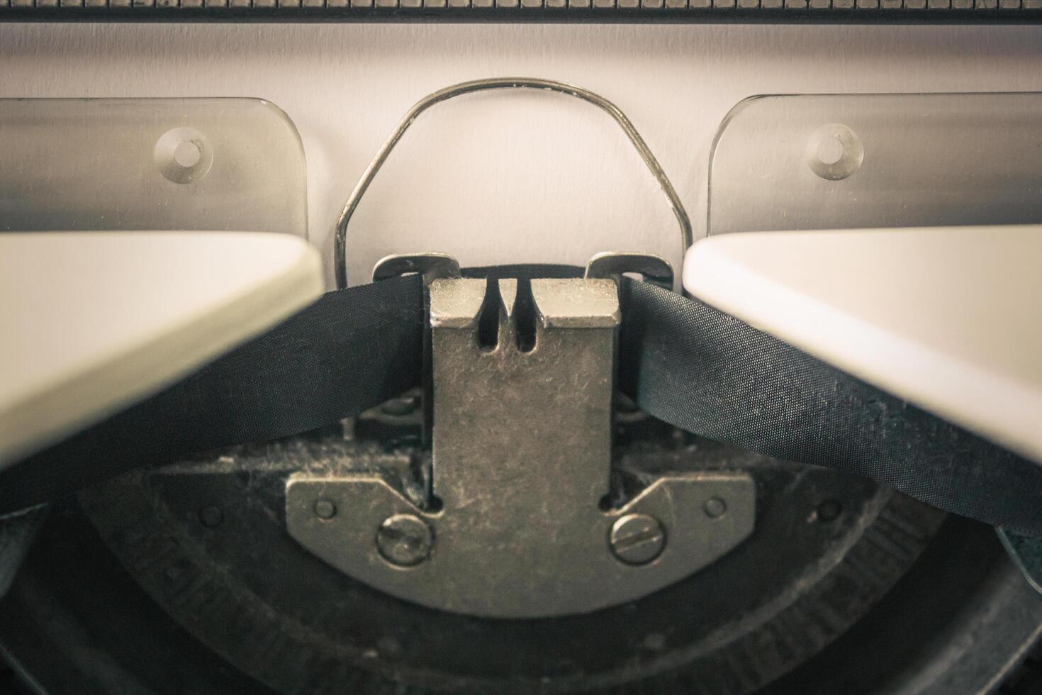 close-up of typewriter with paper sheet, Space for your text. photo