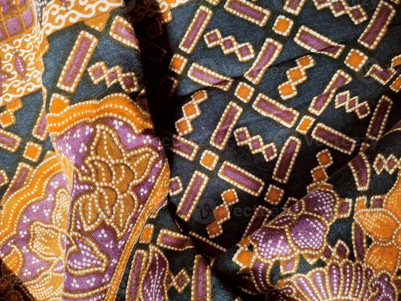 a close up of a colorful patterned fabric photo