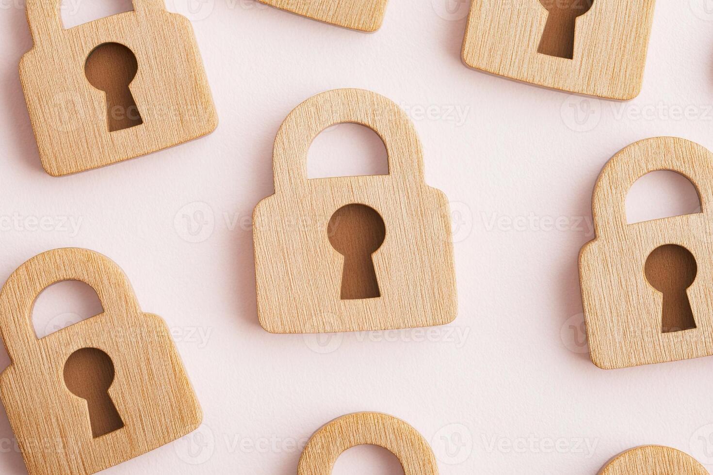 Wooden Padlock Shape, Light Background Symbolizing Security, Safety, and Privacy. photo
