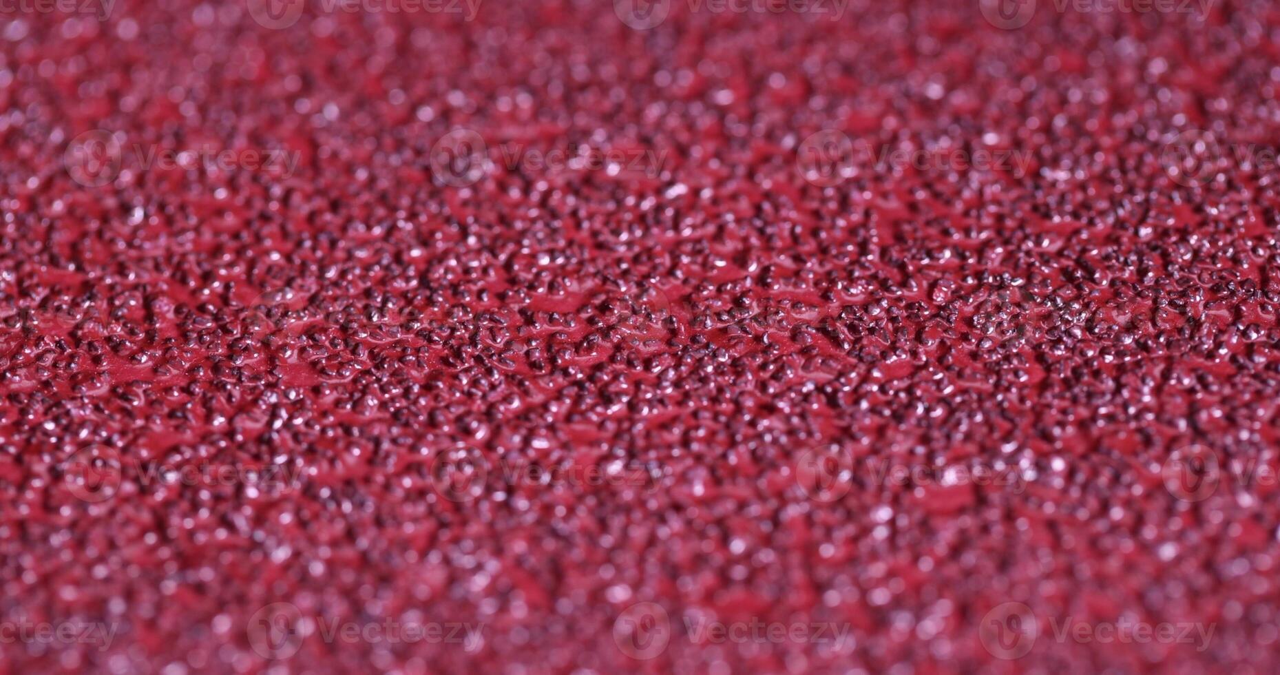 red coarse-grained sandpaper for working with wood and metal photo
