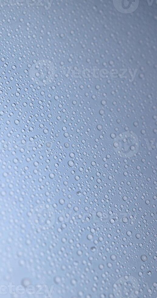 blue wet surface covered with a large number of water photo
