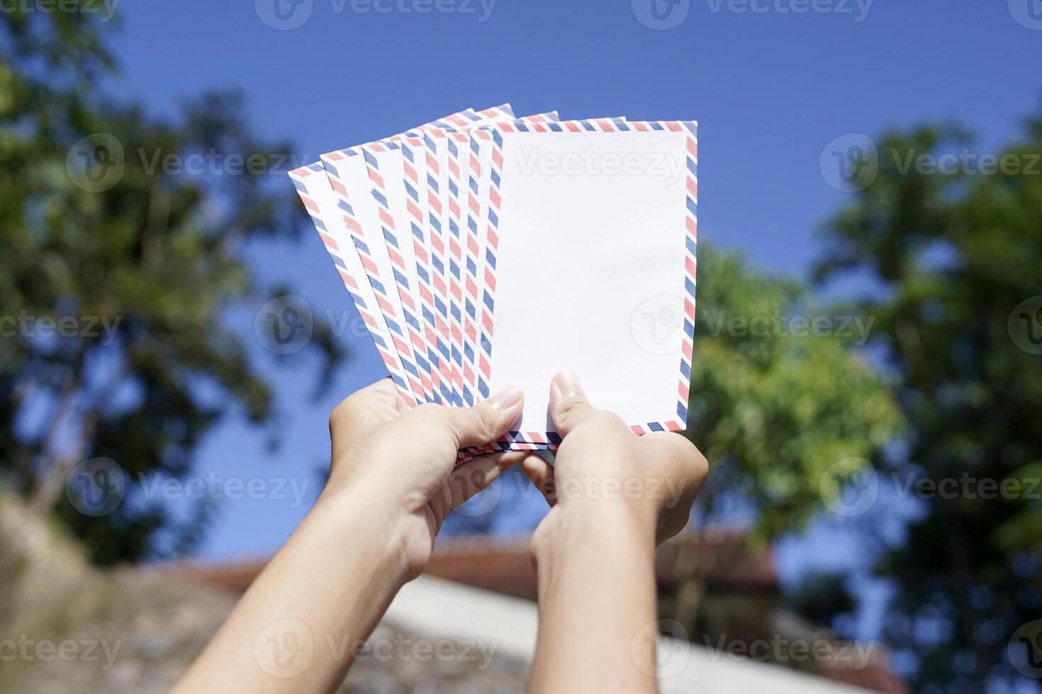 woman shows the envelope to be distributed on the day of Eid photo