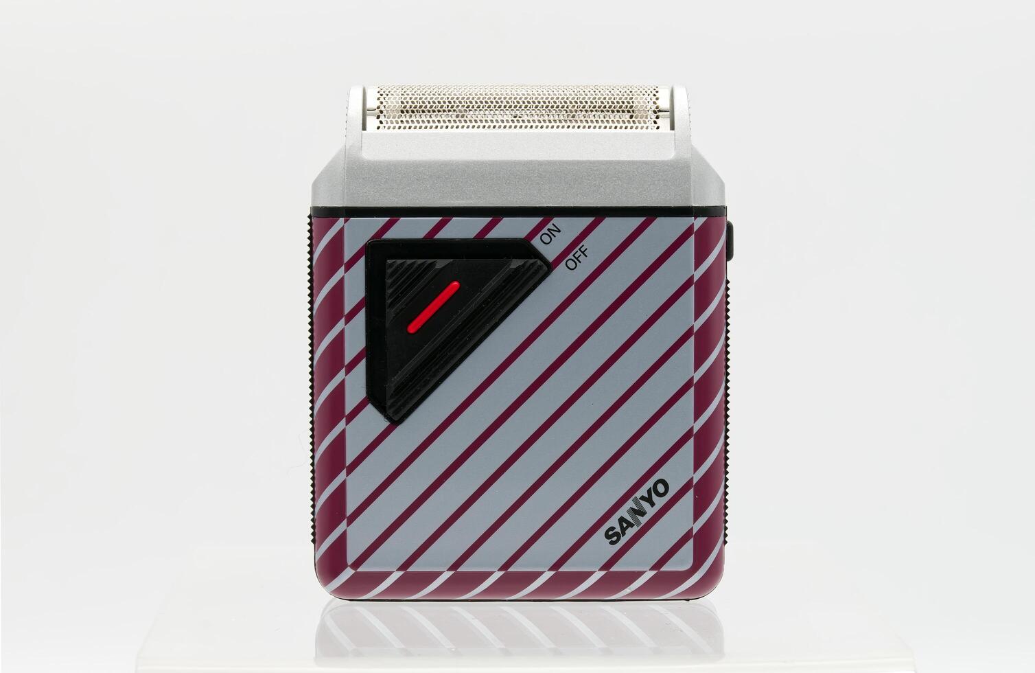 Bologna Italy June 20, 2025 Vintage Sanyo SV-M735 battery shaver isolated on white background. photo