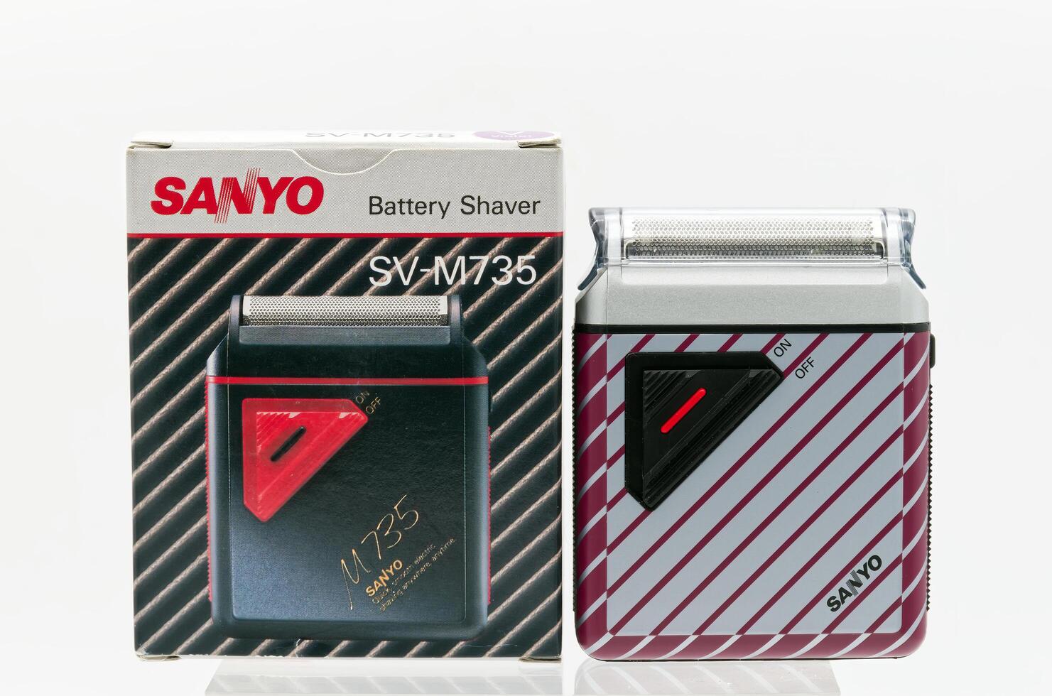 Bologna Italy June 20, 2025 Vintage Sanyo SV-M735 battery shaver and its box. Studio shot photo
