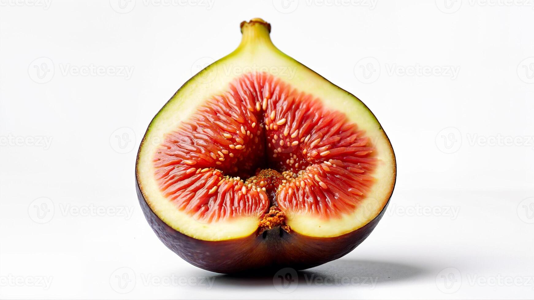A juicy fig half with visible seeds and vibrant flesh, isolated on a white background. Suitable for food, nutrition, and healthy eating concepts. photo