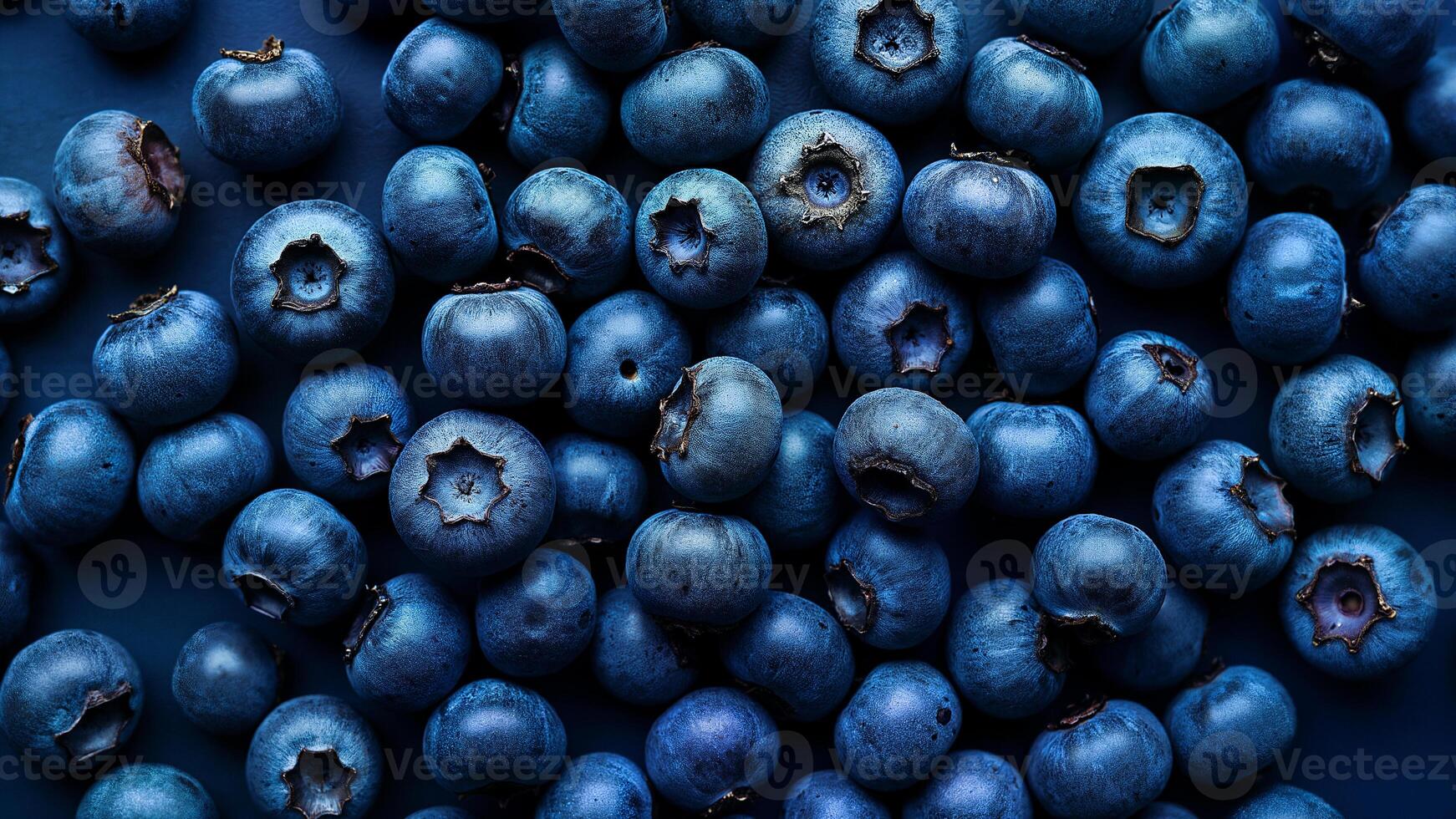 Close-up view of fresh blueberries fills the frame as a background. Useful for food, nutrition, and healthy eating concepts. photo