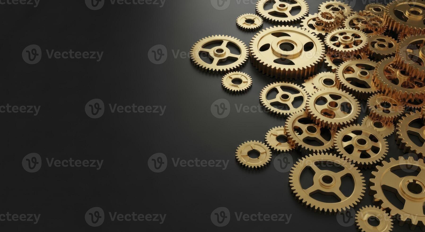 Gleaming golden gears scattered on a dark matte black surface photo