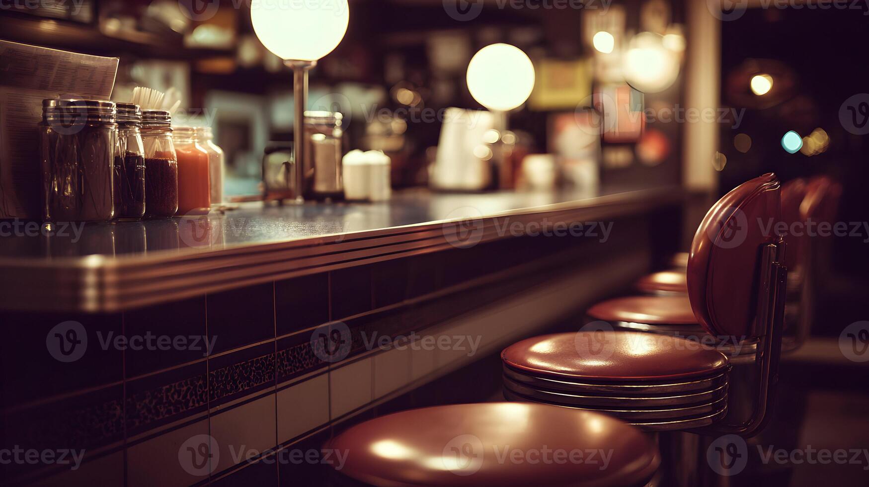 Atmospheric diner interior evoking vintage nostalgia with illuminated bar stools and classic condiment jars photo