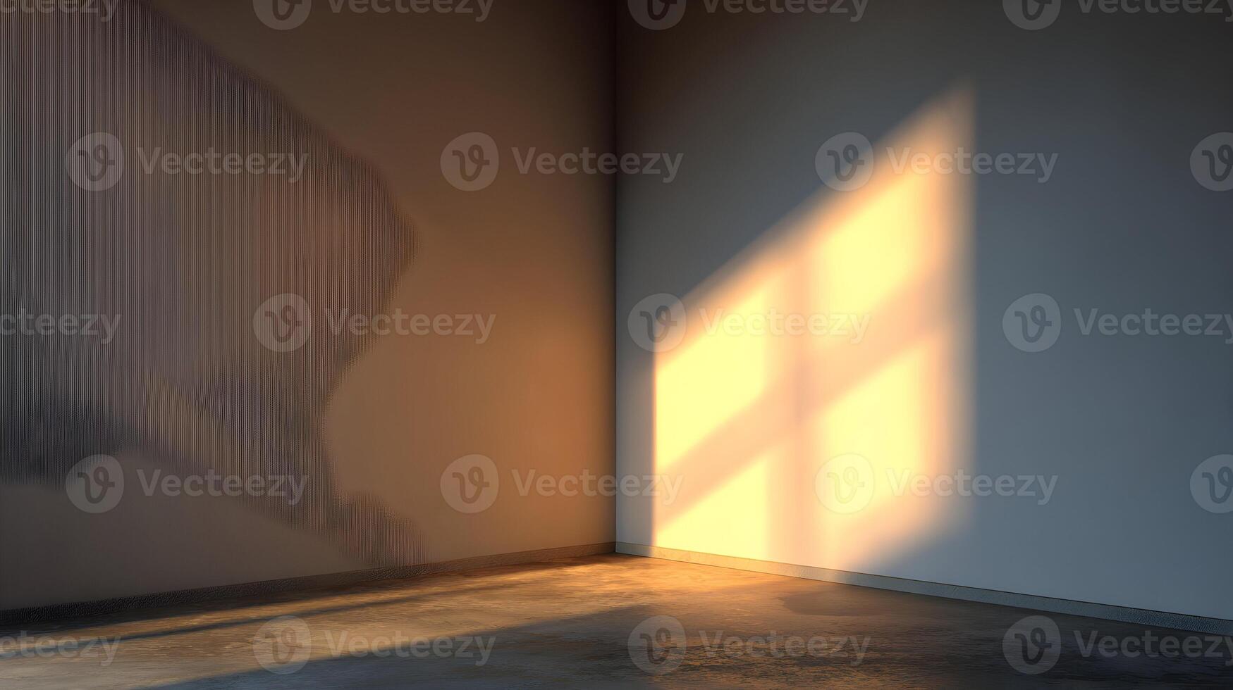Golden light streaming through a window casting shadows in the corner of an empty room indoors photo