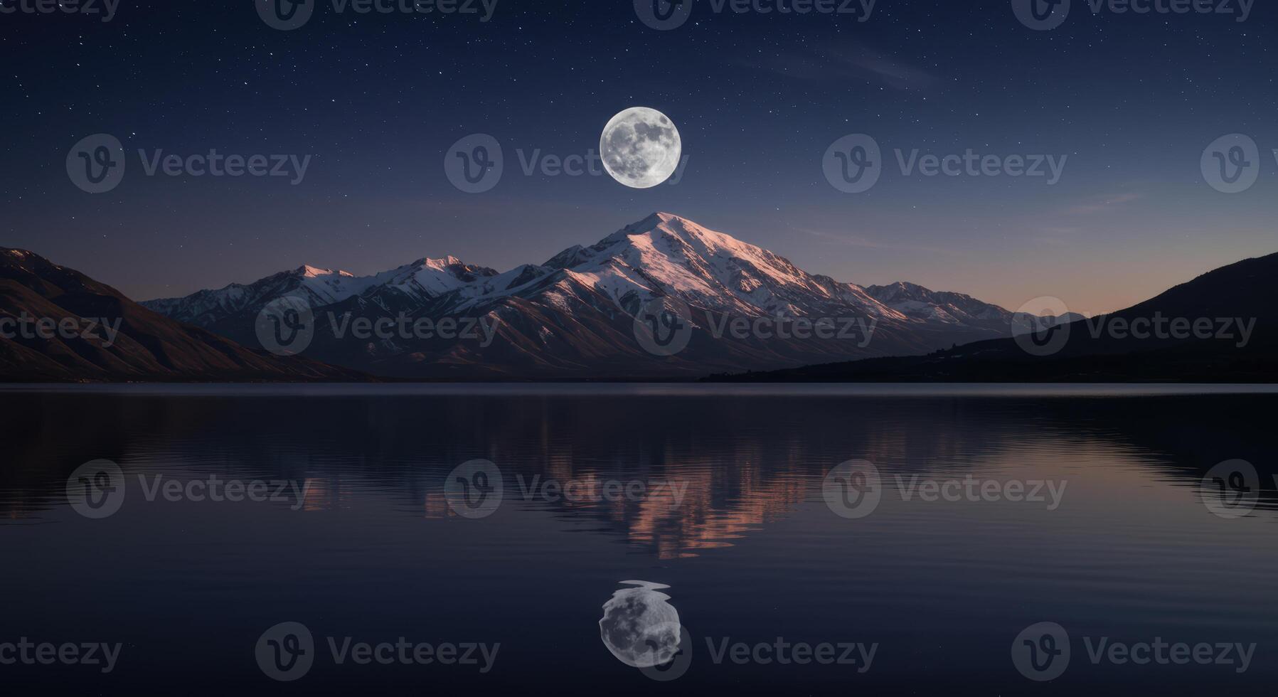 Majestic mountain range under full moon night reflected on still waters creates a serene and tranquil nature landscape photo