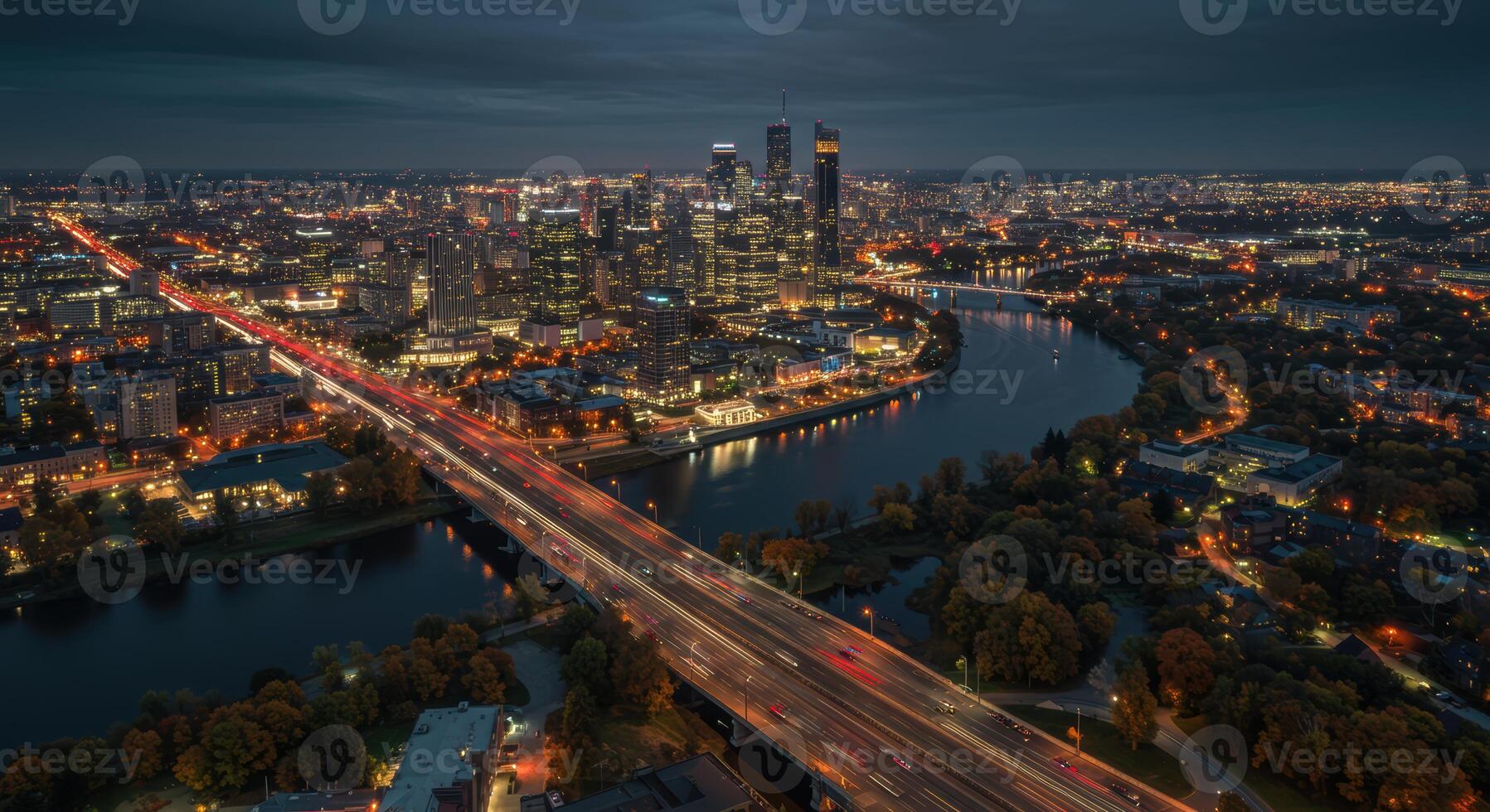 Nighttime cityscape of Warsaw Poland featuring a modern skyline illuminated bridges and flowing river photo