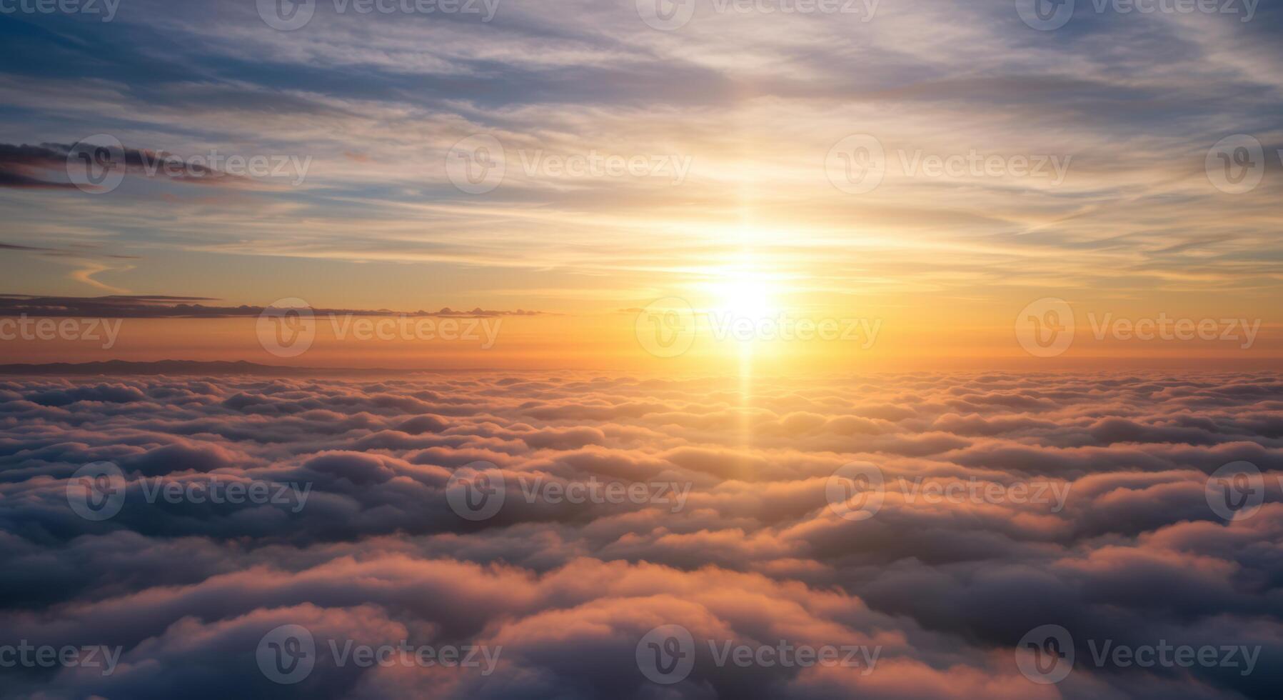 Breathtaking sunrise over a sea of clouds creates an ethereal and majestic sky landscape perfect for travel inspiration photo