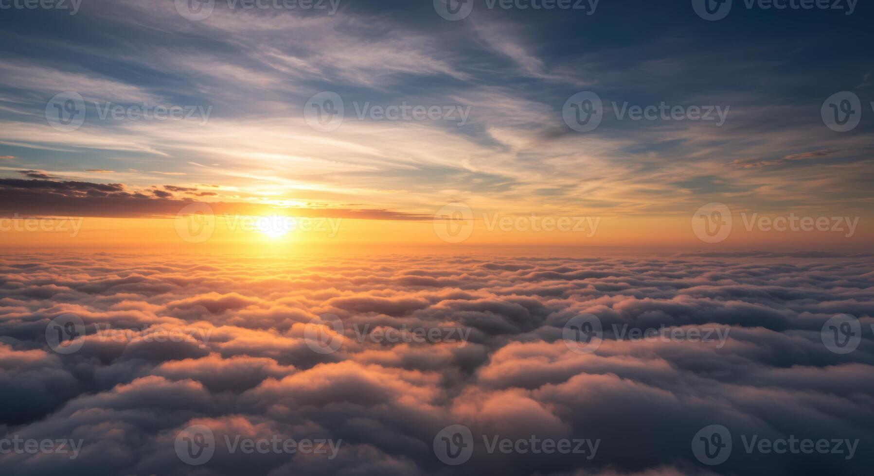 Majestic sunset illuminates a serene cloudscape creating a breathtaking ethereal panorama from above photo