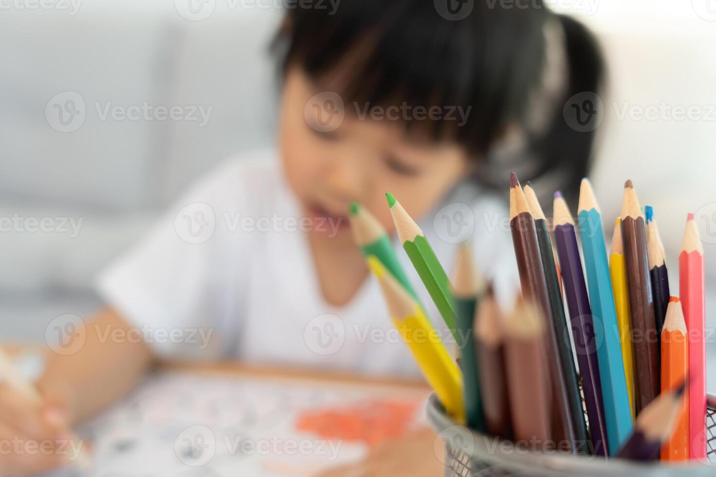 Happy Asia children playing learning paint on paper. Activity, development, IQ, EQ, meditation, brain, muscles, essential skills, family having fun spending time together, photo