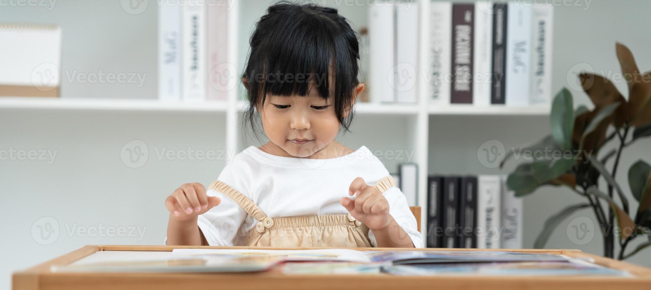 children read book at home. daughter and reading a story. learn development, childcare, laughing, education, storytelling, practice, imagine, reduce addiction mobile phone. photo