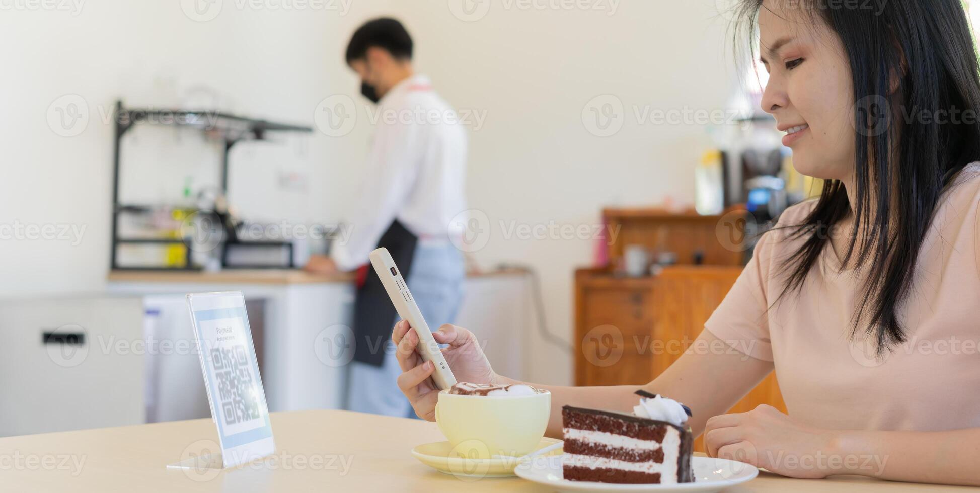 smartphone to scan QR code to pay in cafe restaurant with a digital payment without cash. Choose menu and order accumulate discount. E wallet, technology, pay online, credit card, bank app photo