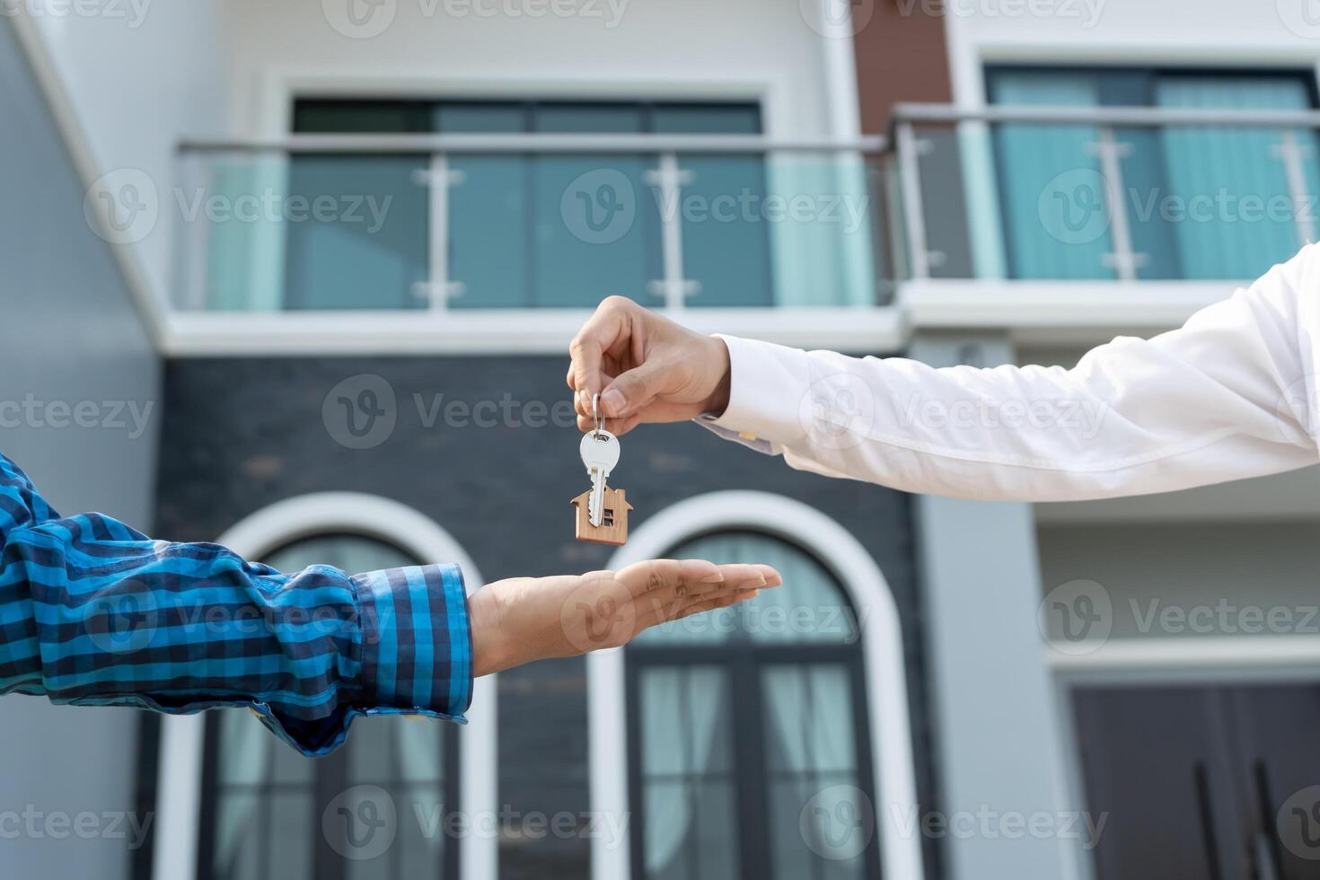 rental and selling home, Real estate agent manager smile holding key for new owner. rent house, Sales, loan credit financial, insurance, Seller, dealer, installment, buy, sell, move in photo