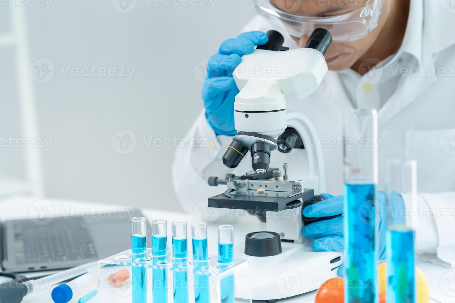Scientist analyze biochemical samples in advanced scientific laboratory. Medical professional use microscope look microbiological developmental of viral, Biotechnology research photo