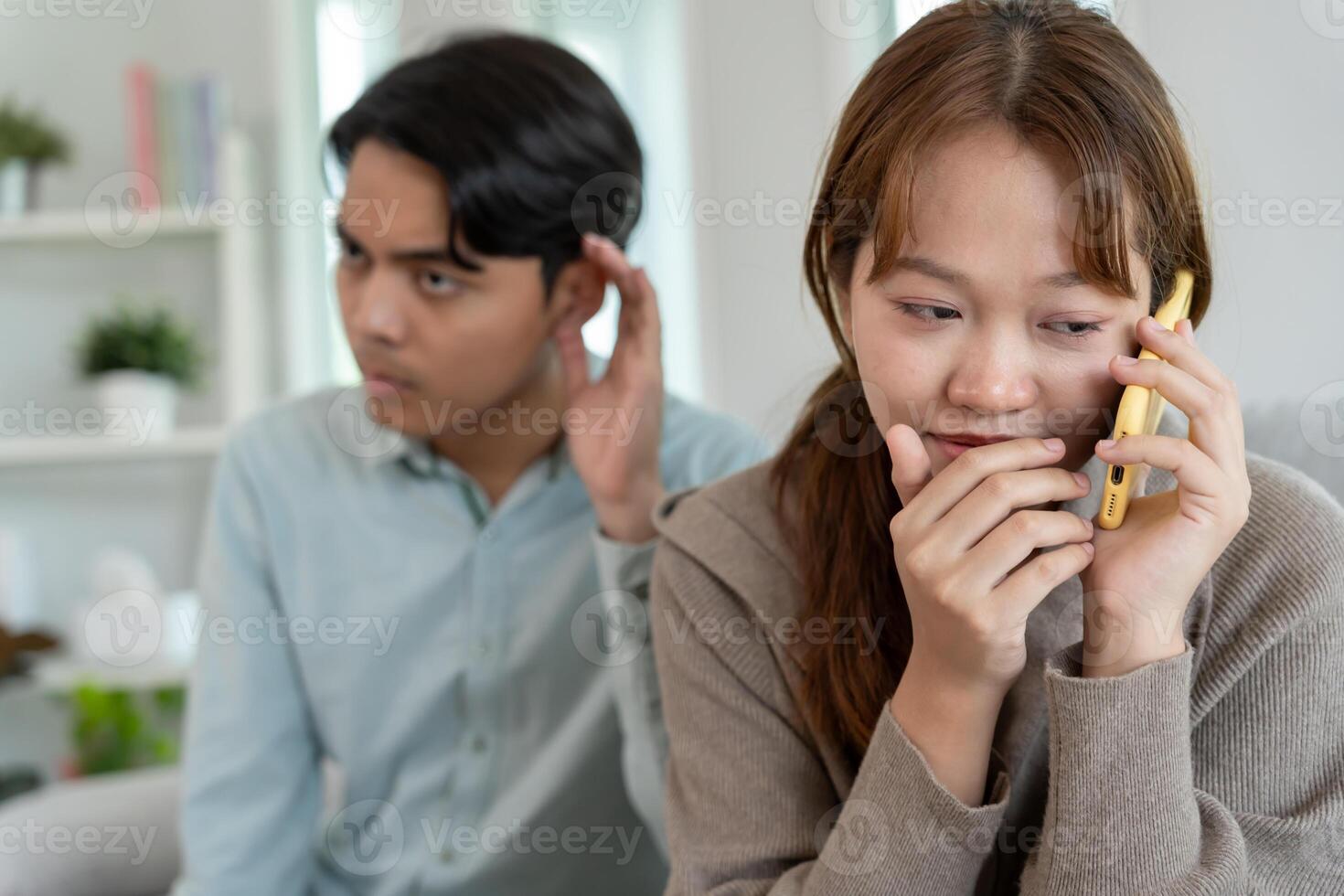 Double dating wife use phone for call somebody, have a fling, Bit on the side , Commit adultery ,Polygamy, wife was having an affair. family problem, infidelity, divorce, separate. photo