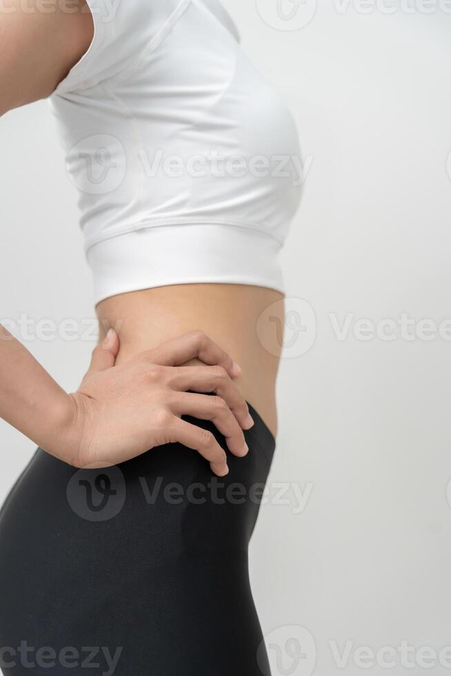 Diet woman on weight scale, results of diet. Beautiful shape. reduced waist size after under going a weight loss corse. balance, control, routines, exercise. photo