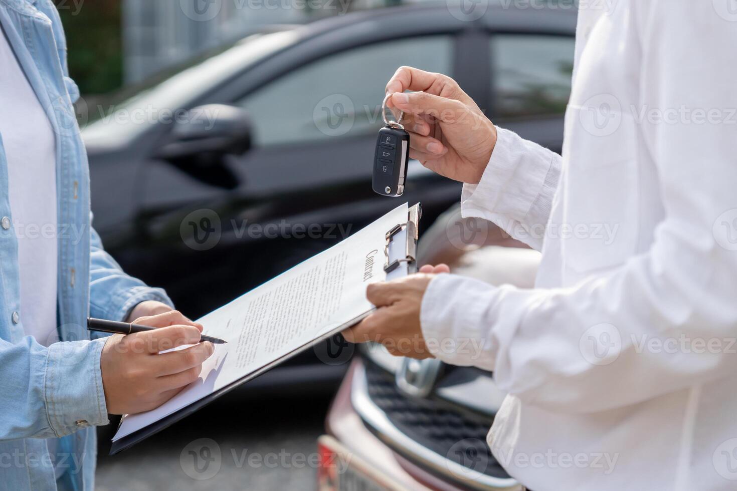lease, rental car. sell, buy. Dealership manager send car keys to the new owner. Sales, loan credit financial, rent vehicle, insurance, renting, Seller, dealer, installment, car care business photo
