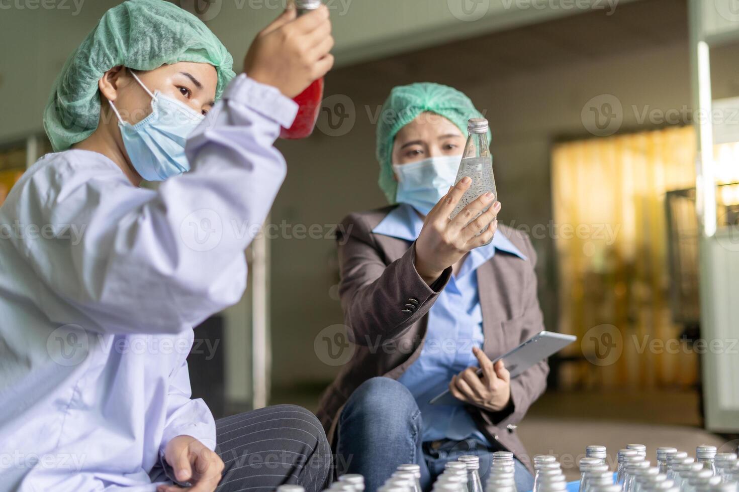 Business owner of food or beverages and quality team inspection about quality control food or beverages before send product to the customer. Quality control or assurance. photo