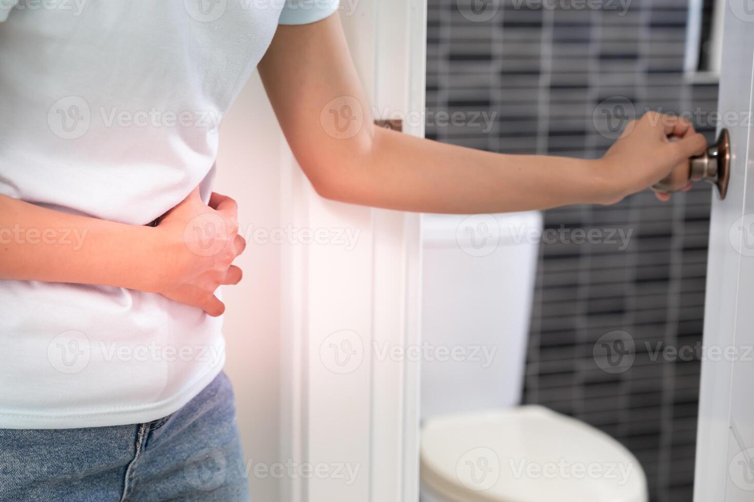 diarrhea in bathroom, Hurt woman touch belly stomach ache painful. colon inflammation problem, toxic food, abdominal pain, abdomen, constipated in toilet, stomachache, Hygiene photo