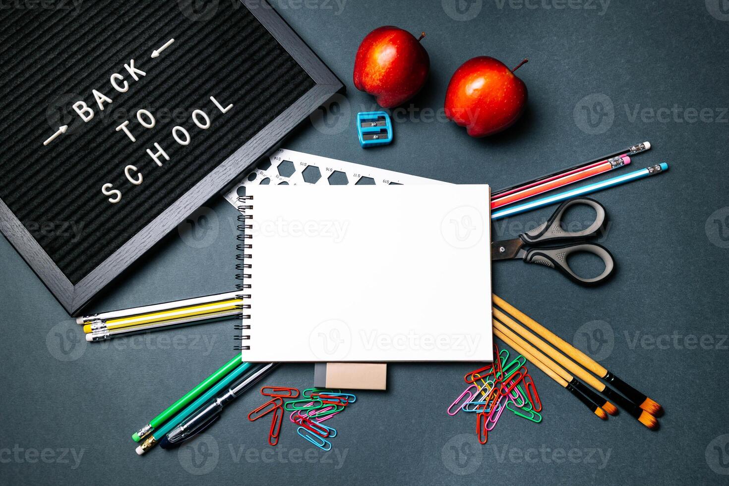 Start of School Year Concept with Apples and Supplies photo