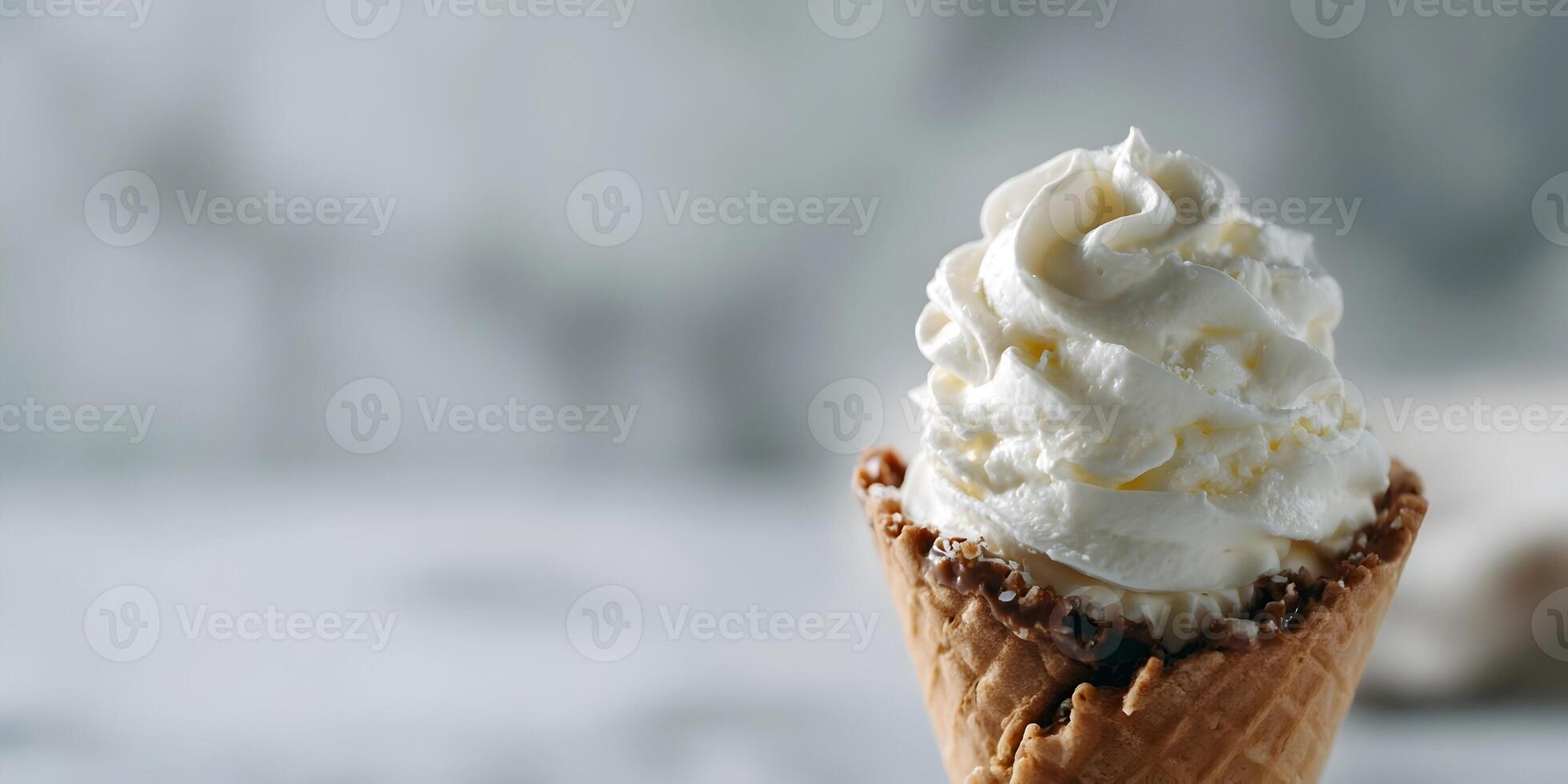 Closeup of Vanilla Ice Cream Cone with Chocolate Coating photo