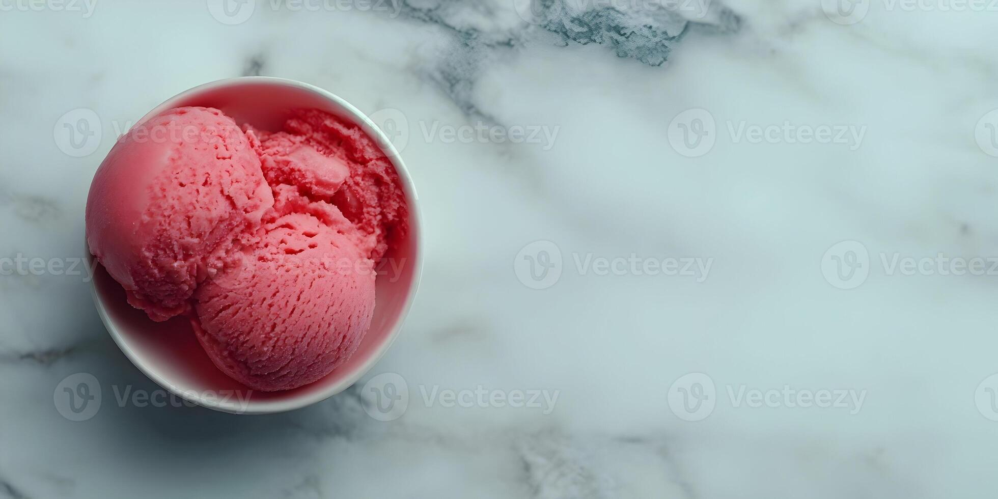Pink Ice Cream Scoops in White Bowl on Marble Background photo