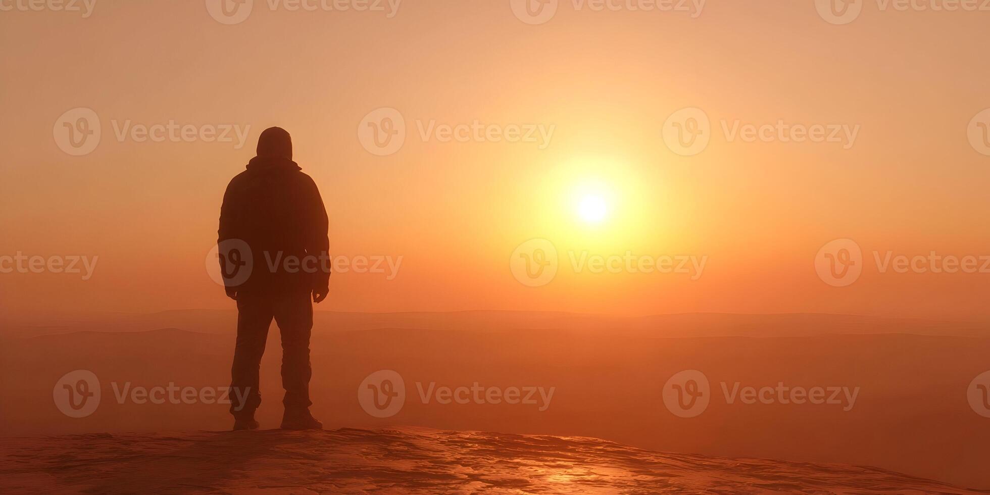 Man Silhouette on Mountaintop at Sunrise Orange Sky Landscape photo