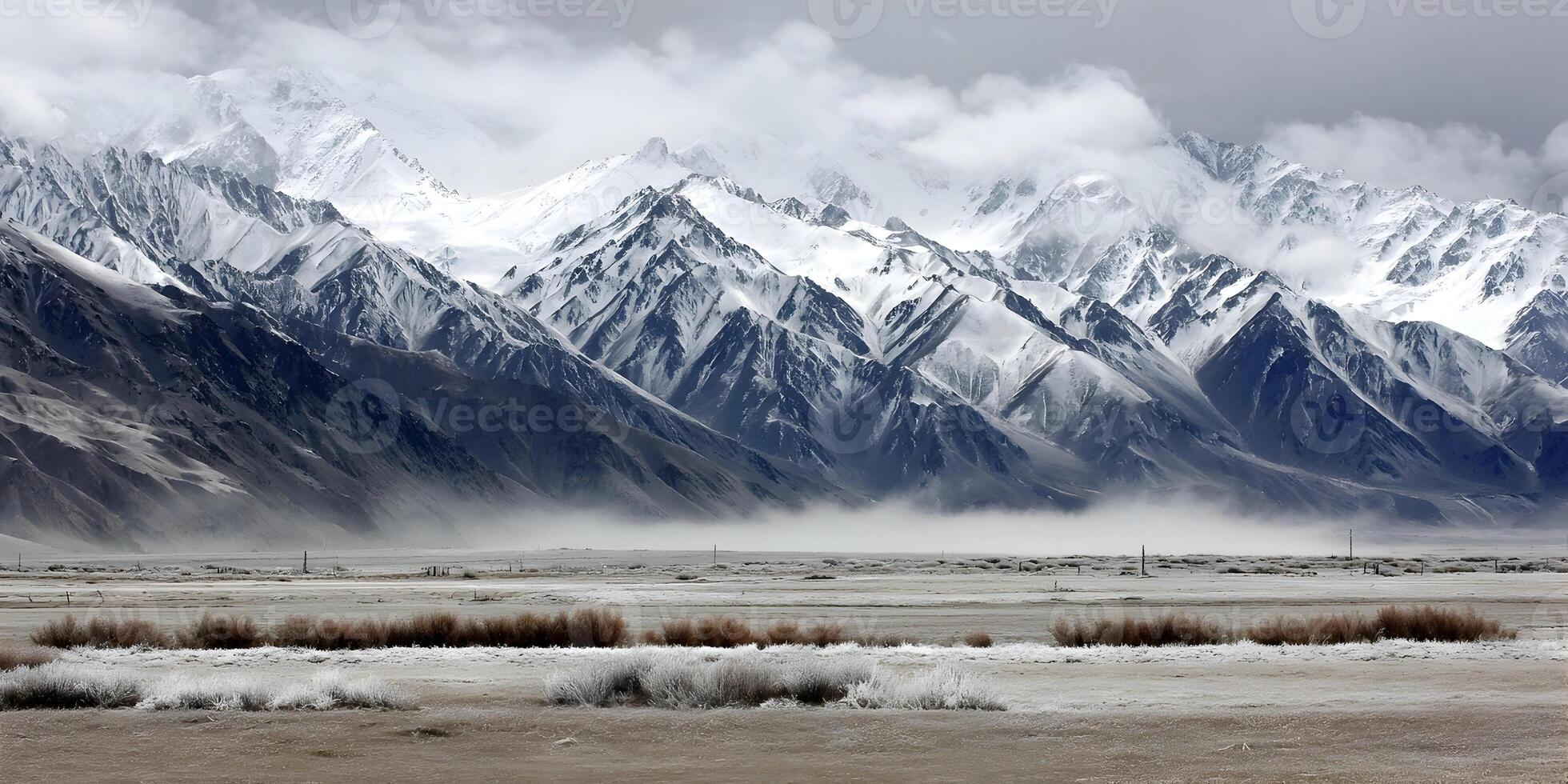 Snowcapped Mountain Range Dramatic Landscape Winter Scene photo