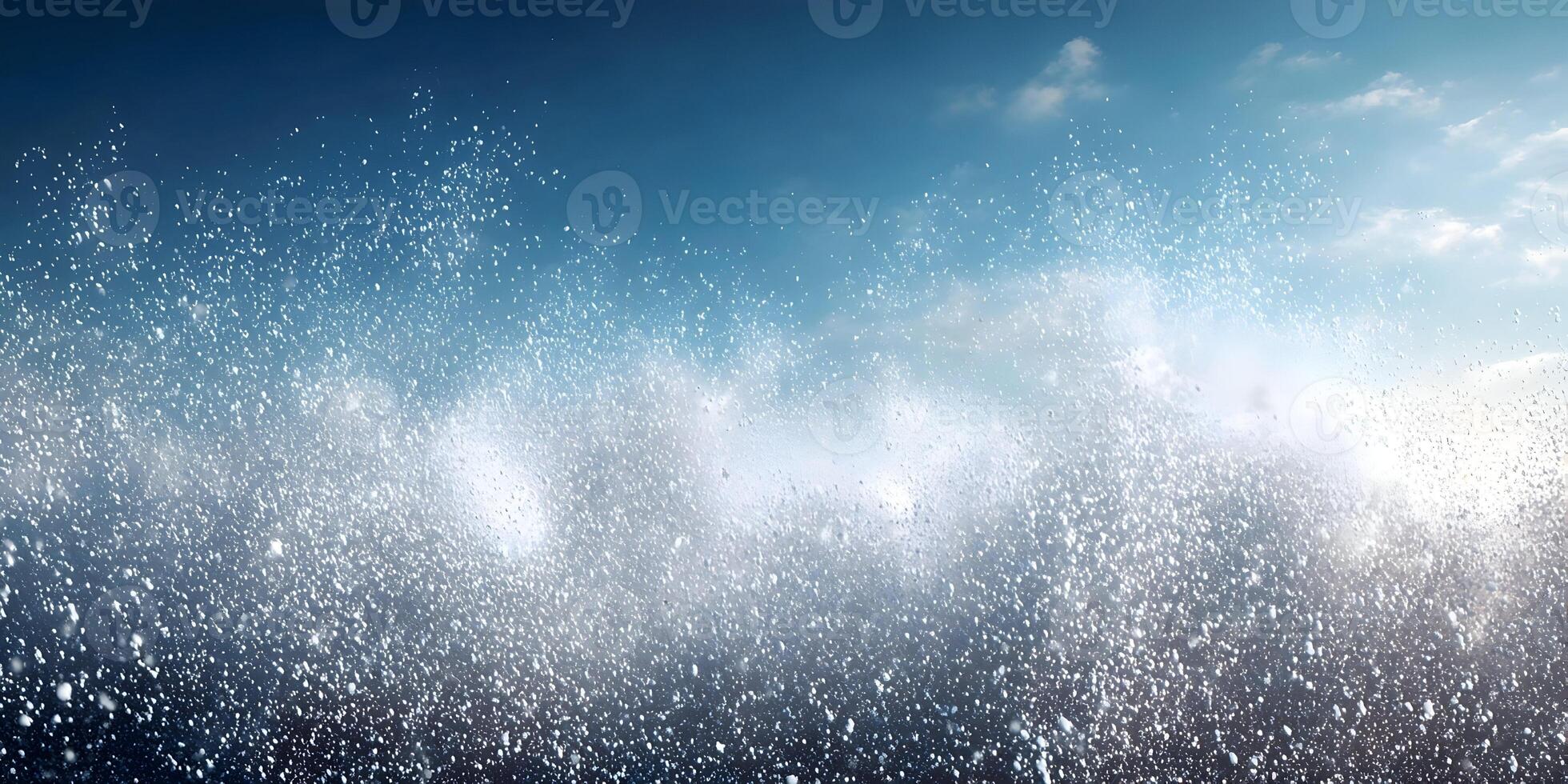 White Particles Exploding Against Blue Sky Background photo