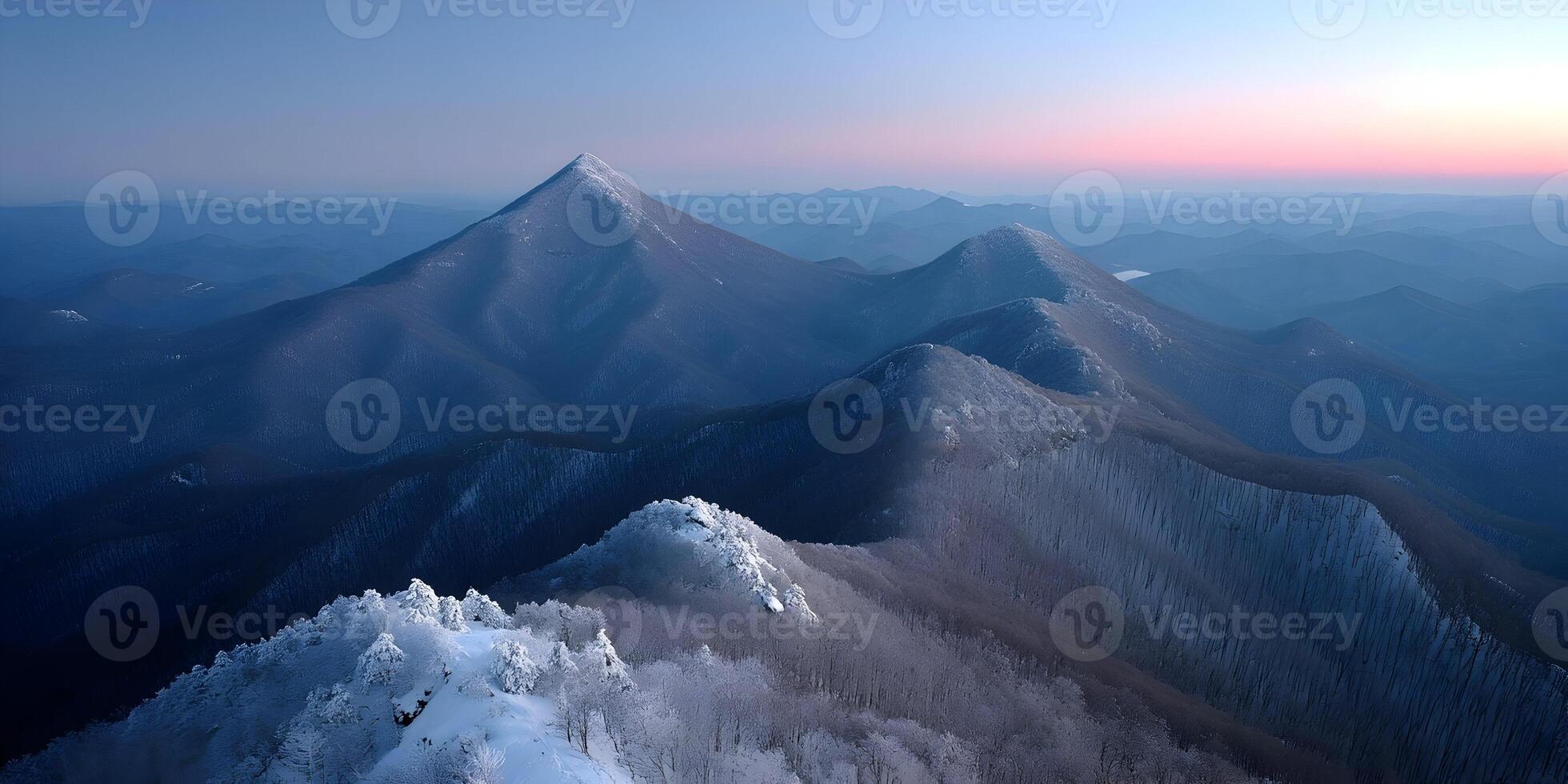 Snow Covered Mountain Range Aerial View Winter Landscape Sunrise photo