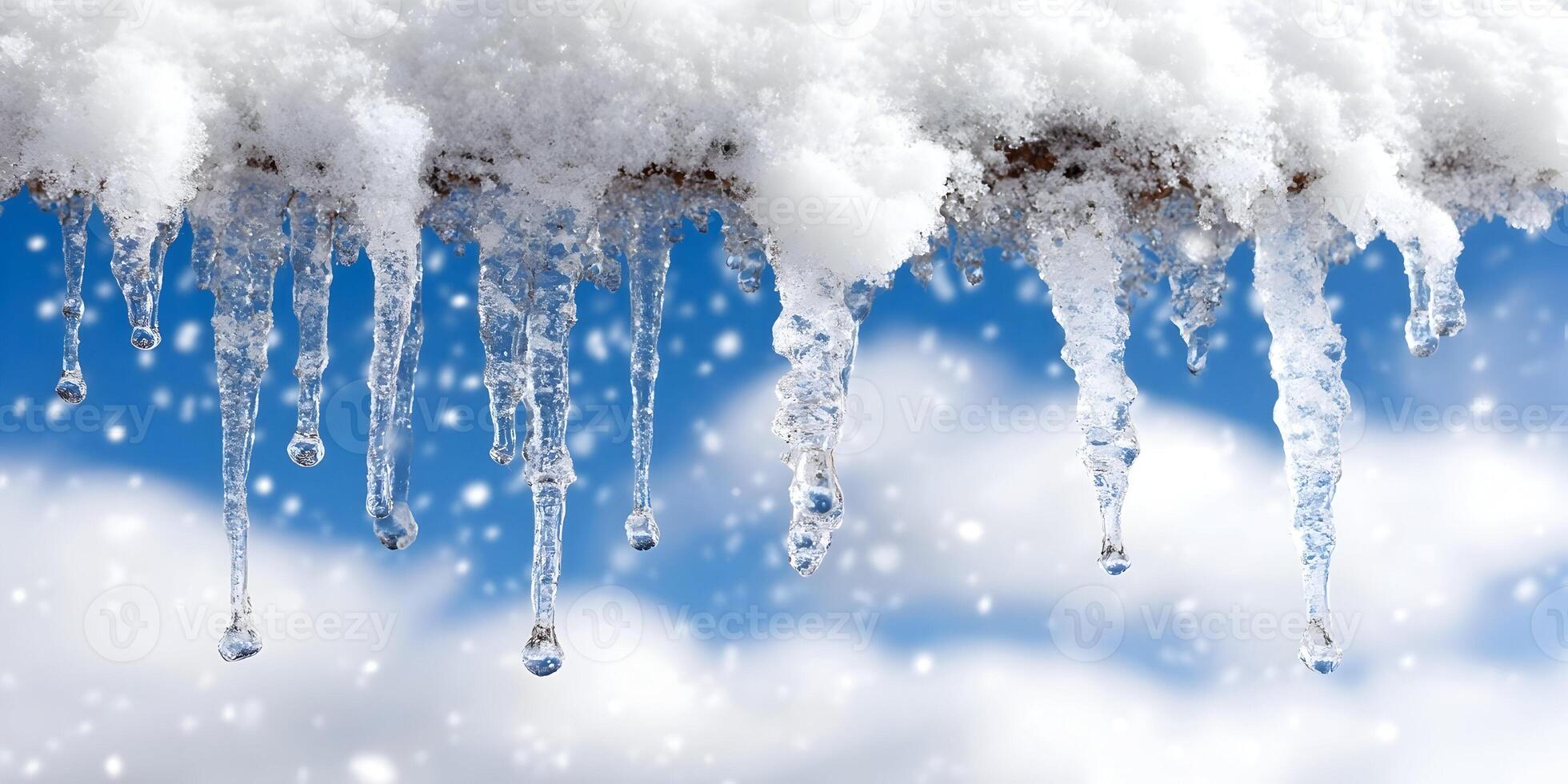 Melting Icicles Hanging From Snow Covered Surface Winter Scene photo