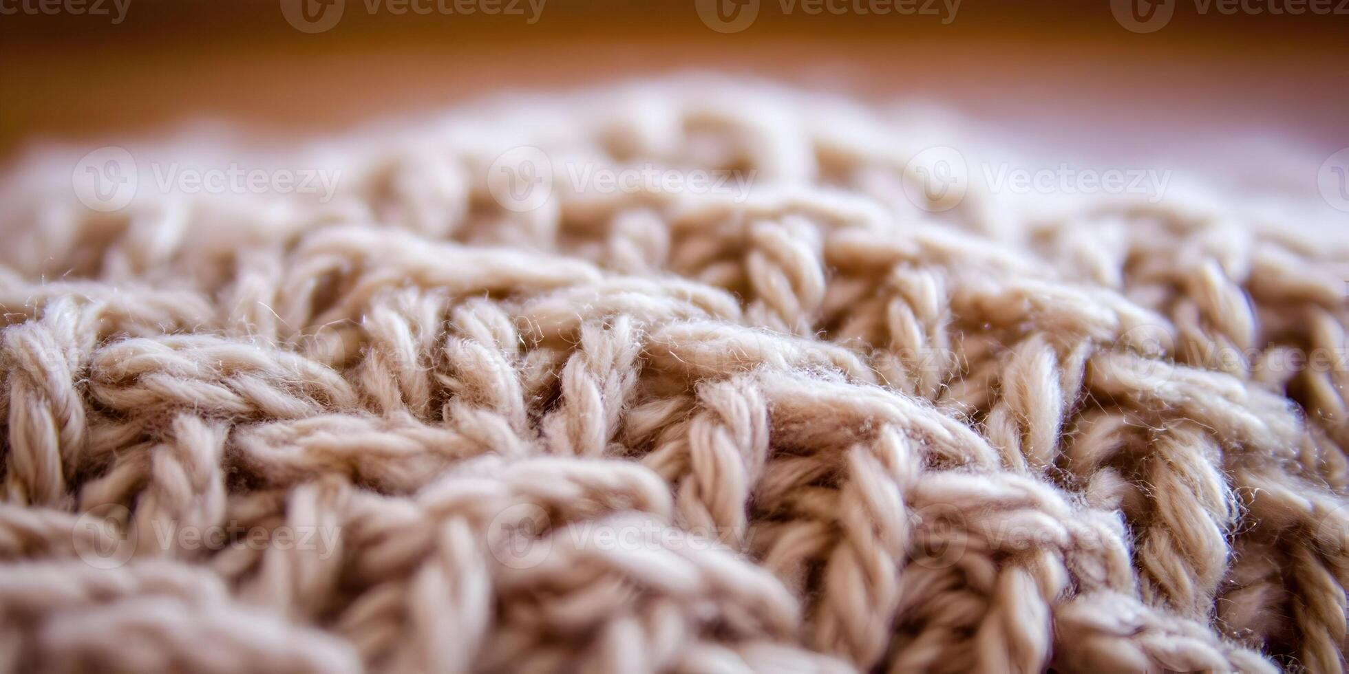 Close-Up of Beige Knitted Fabric Texture photo