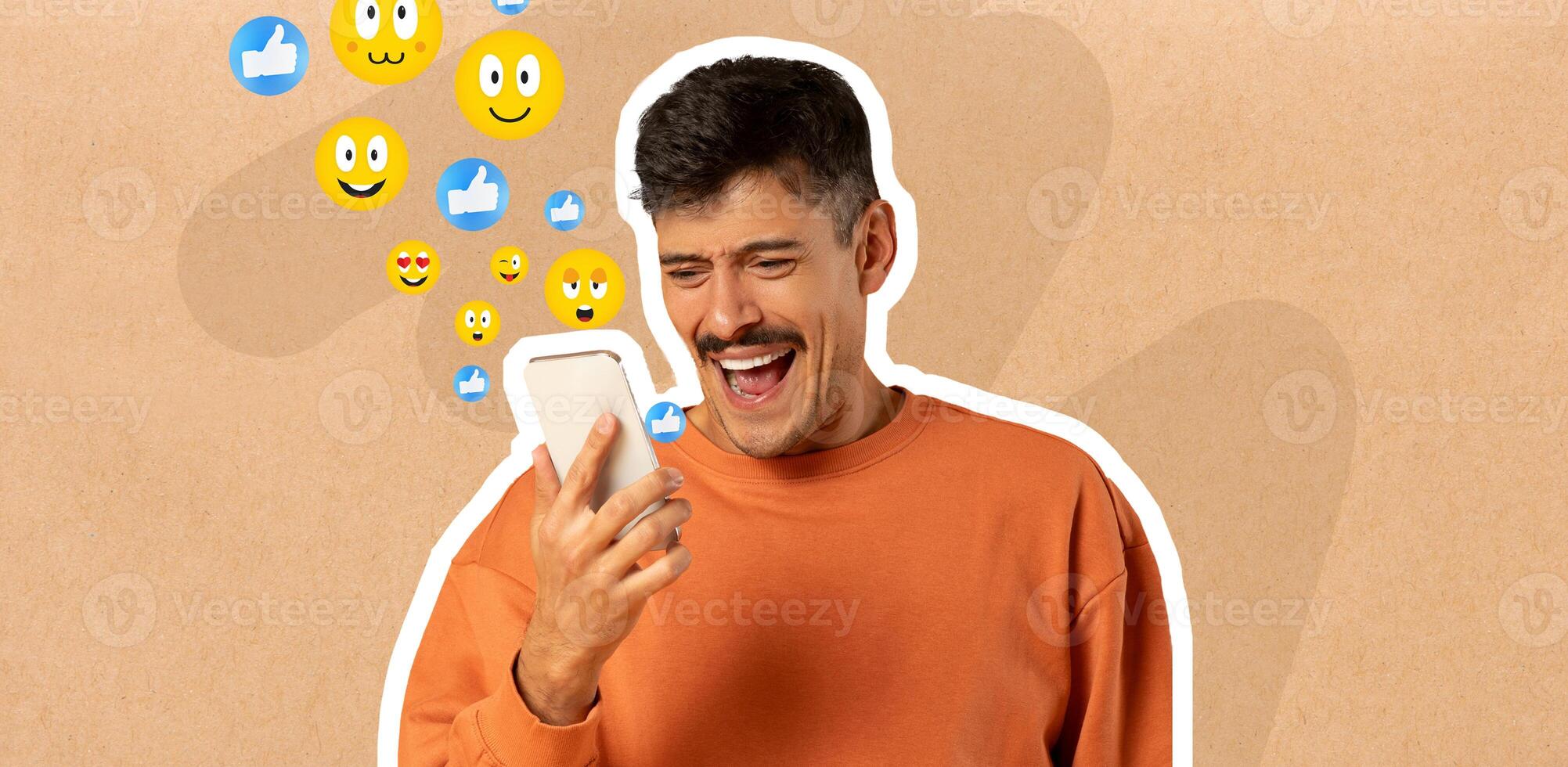 A man in a cozy orange sweater smiles broadly while texting on his smartphone. Emojis and likes appear around him, highlighting his joyful engagement with social media at home. photo