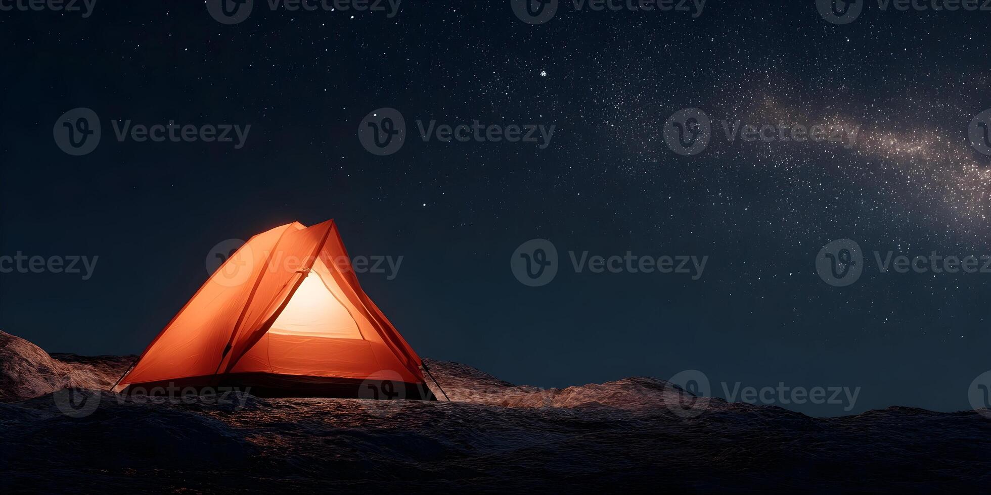 Illuminated Camping Tent Under Night Sky with Milky Way photo