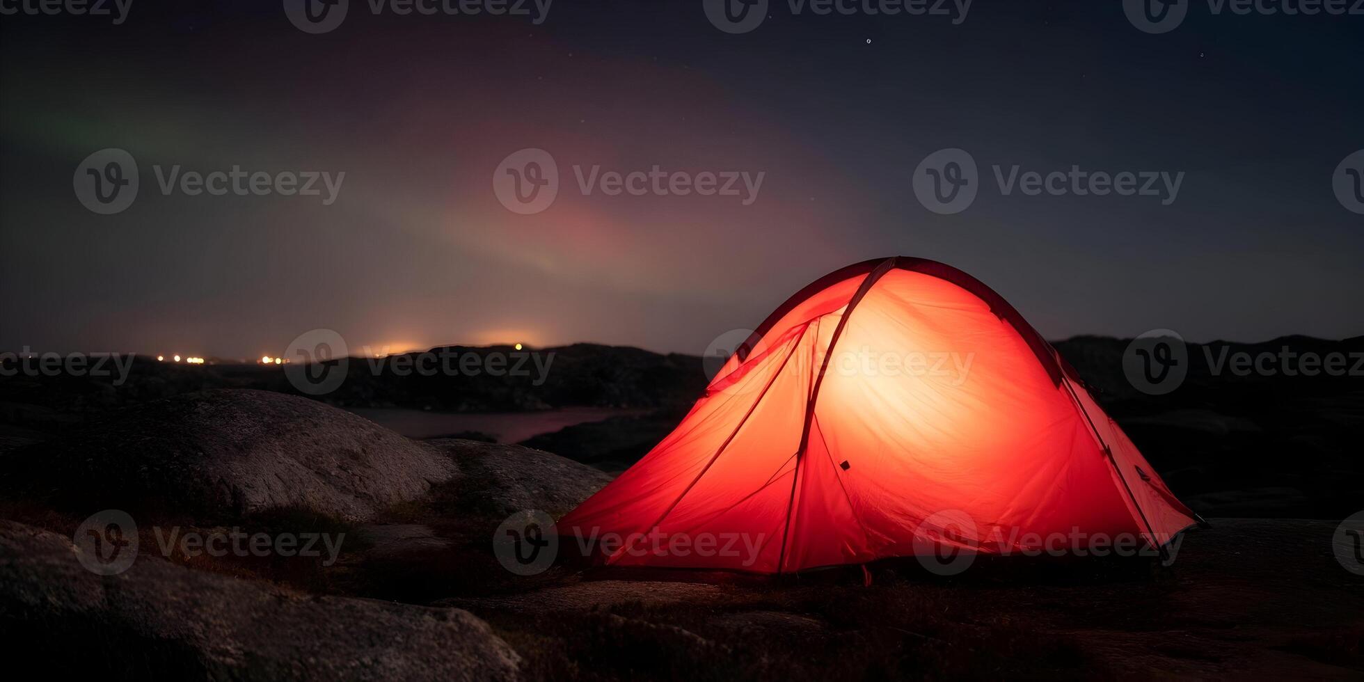 Illuminated Red Tent Camping at Night Under Aurora Borealis Starscape photo
