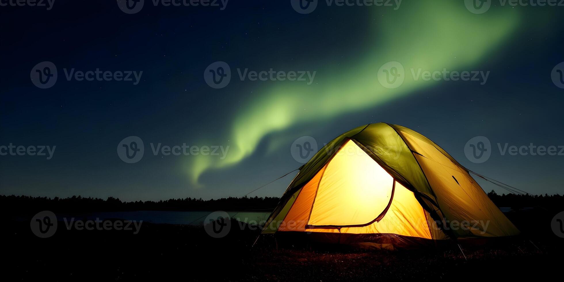 Illuminated Camping Tent Under Northern Lights Night Sky Stars Landscape photo