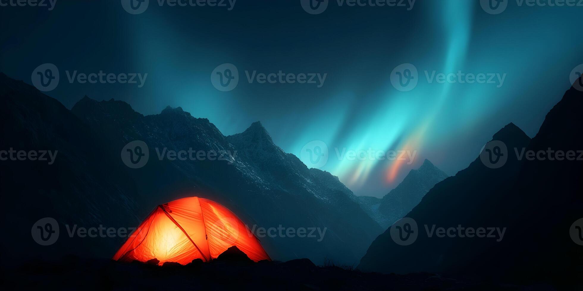 Illuminated Camping Tent in Mountain Range under Aurora Borealis photo
