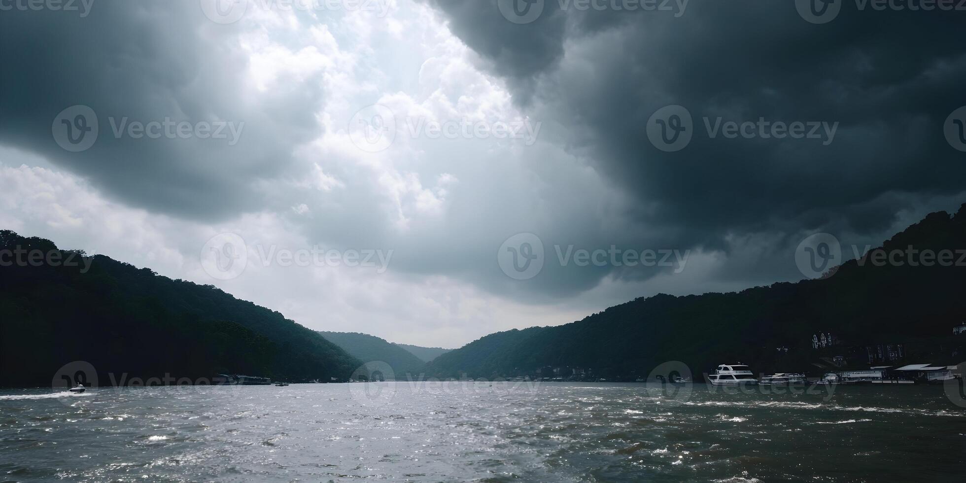 Dark Clouds Over River Landscape Boats Hills photo